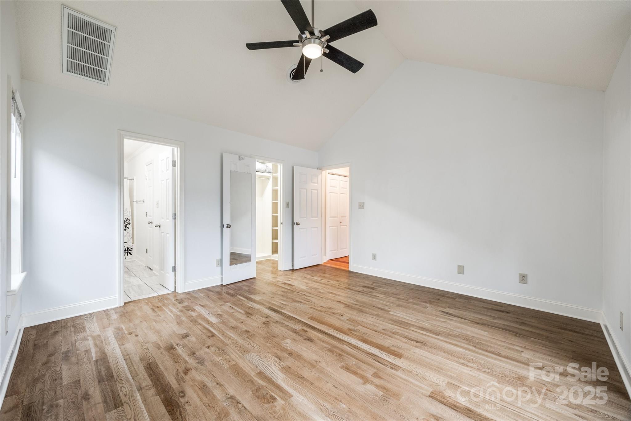 1545 Wimbleton Woods Drive Fort Mill, SC 29708 - Photo 19 of 42 a view of a room with a ceiling fan and a window