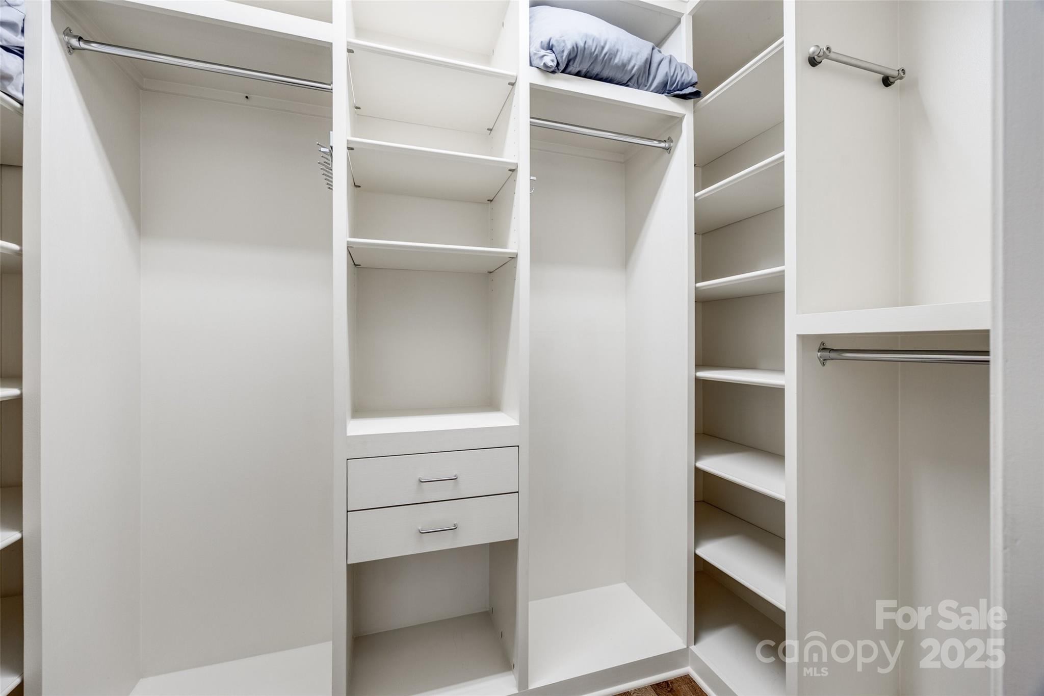 1545 Wimbleton Woods Drive Fort Mill, SC 29708 - Photo 20 of 42 a view of walk in closet with empty racks