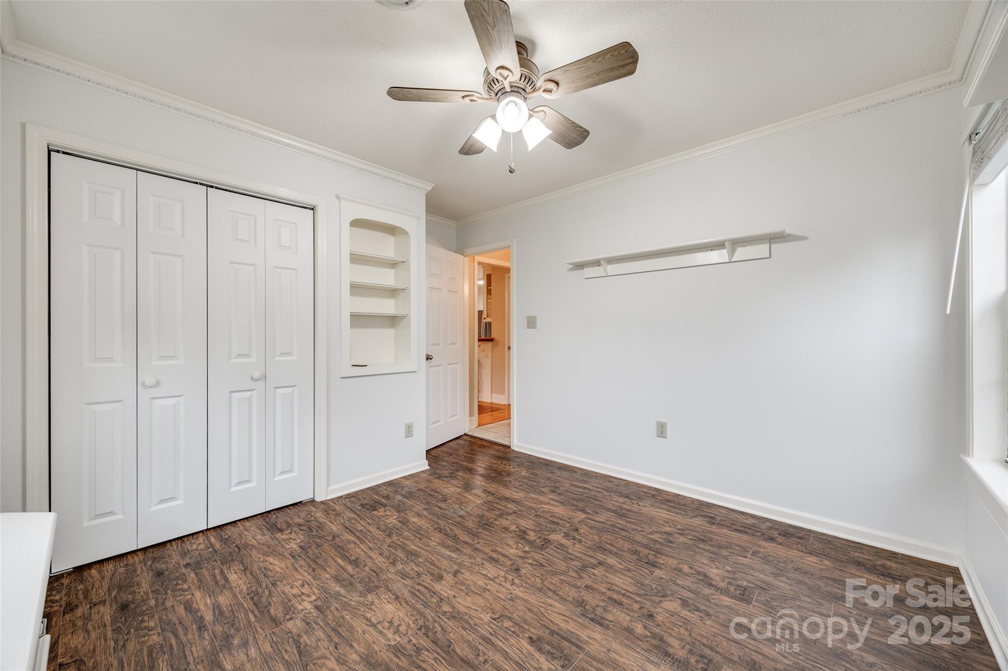 1545 Wimbleton Woods Drive Fort Mill, SC 29708 - Photo 22 of 42 a view of an empty room with a ceiling fan
