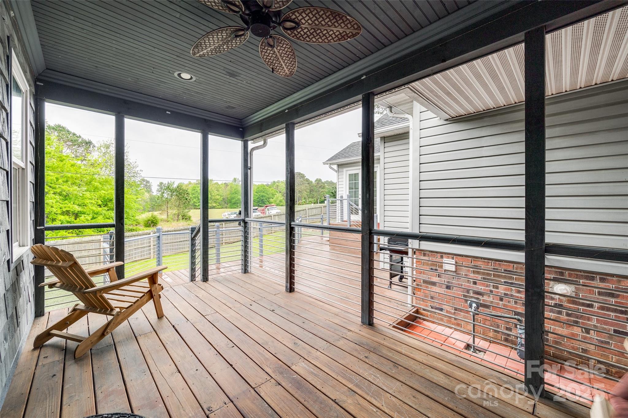 1545 Wimbleton Woods Drive Fort Mill, SC 29708 - Photo 29 of 42 a roof deck with wooden floor and furniture