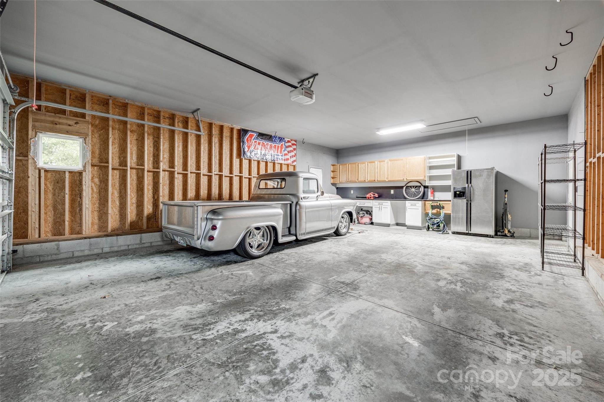 1545 Wimbleton Woods Drive Fort Mill, SC 29708 - Photo 30 of 42 a view of parking garage with cars