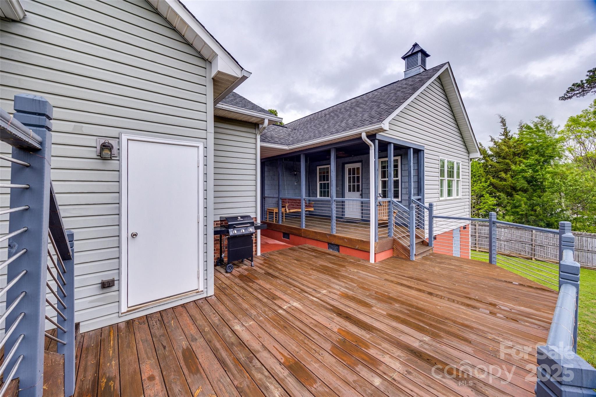 1545 Wimbleton Woods Drive Fort Mill, SC 29708 - Photo 32 of 42 a view of a house with wooden floor and a yard