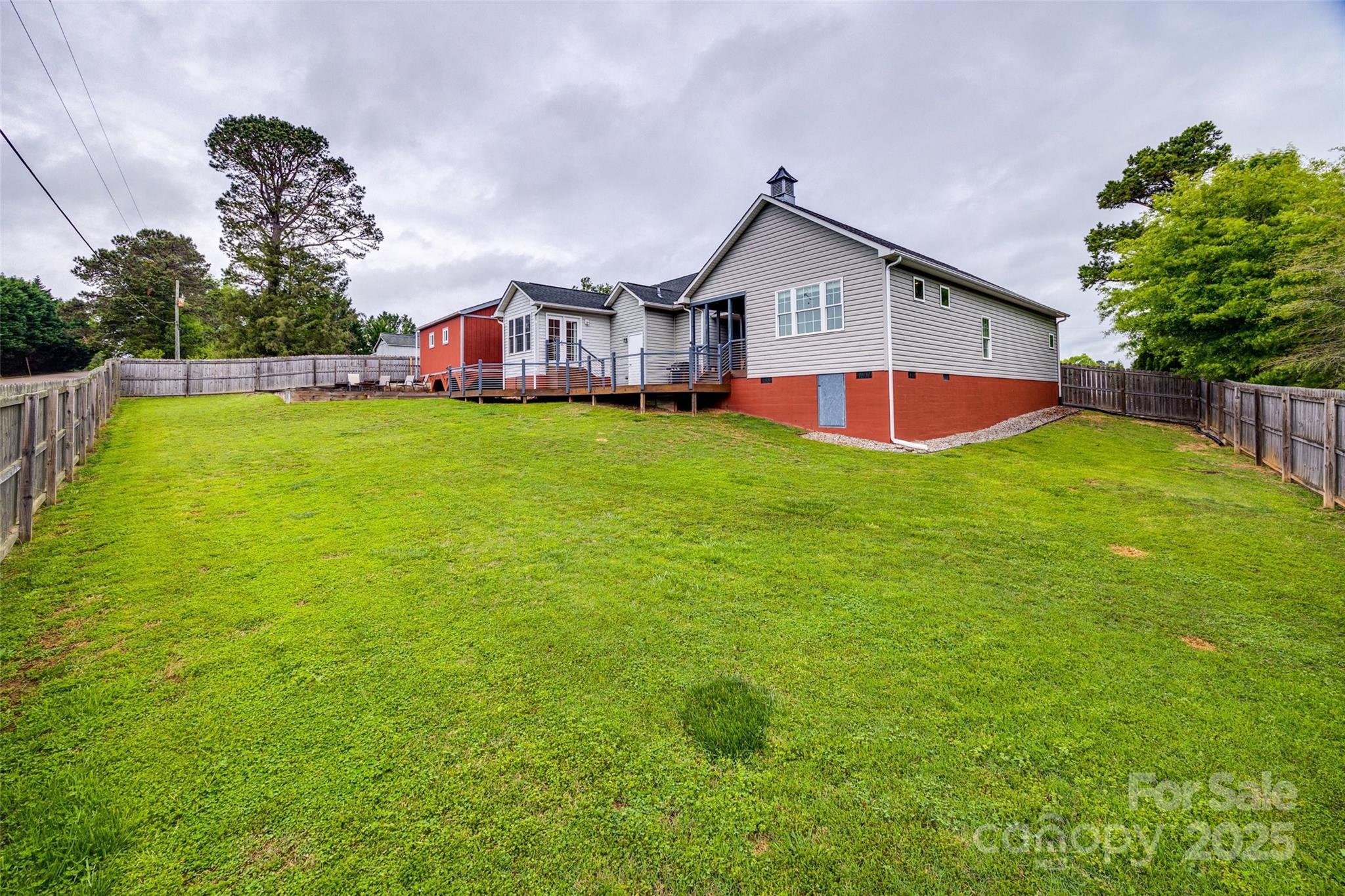 1545 Wimbleton Woods Drive Fort Mill, SC 29708 - Photo 36 of 42 a front view of house with yard and seating area