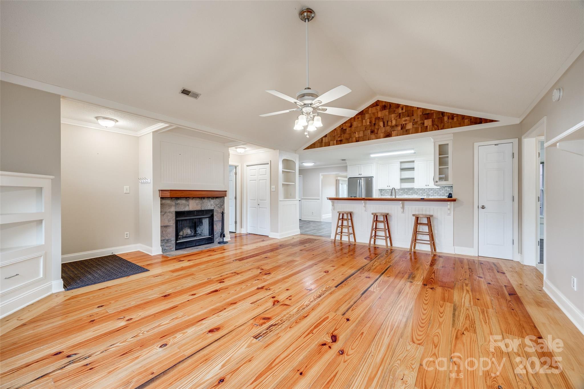 1545 Wimbleton Woods Drive Fort Mill, SC 29708 - Photo 4 of 42 a room with a bed and a fireplace