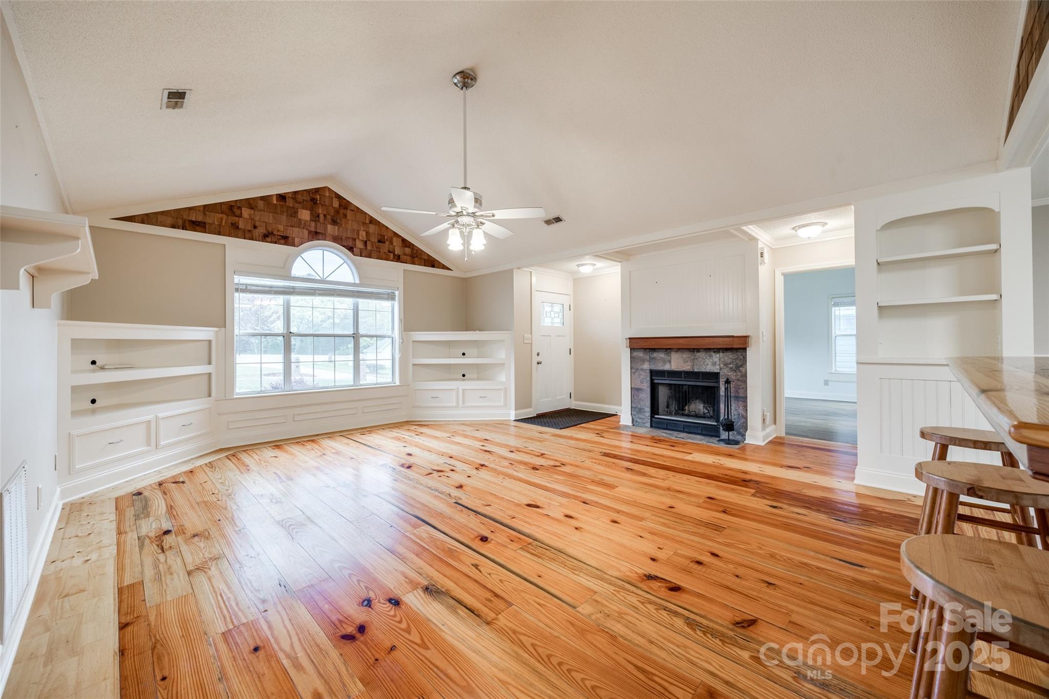 1545 Wimbleton Woods Drive Fort Mill, SC 29708 - Photo 6 of 42 a view of an empty room with a window and fireplace
