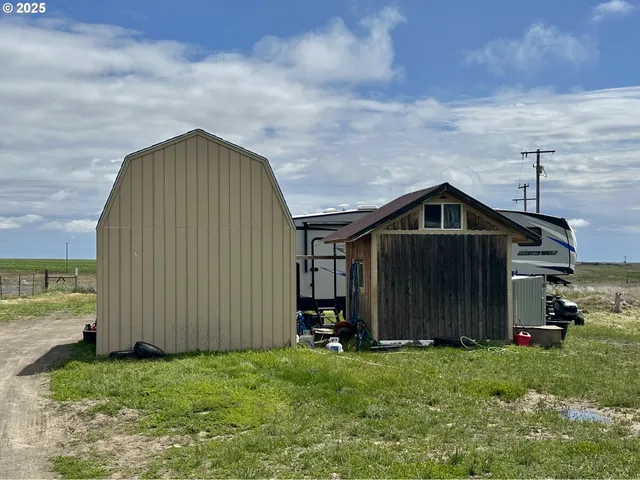 a view of cars parked in front of a building