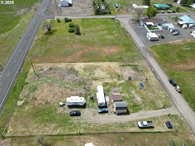 a view of a lake with a car parked in the ocean