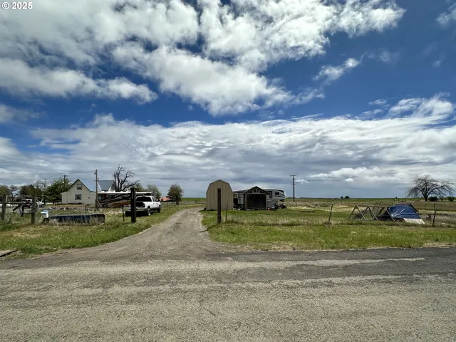 a view of a water with lots of buildings in the background