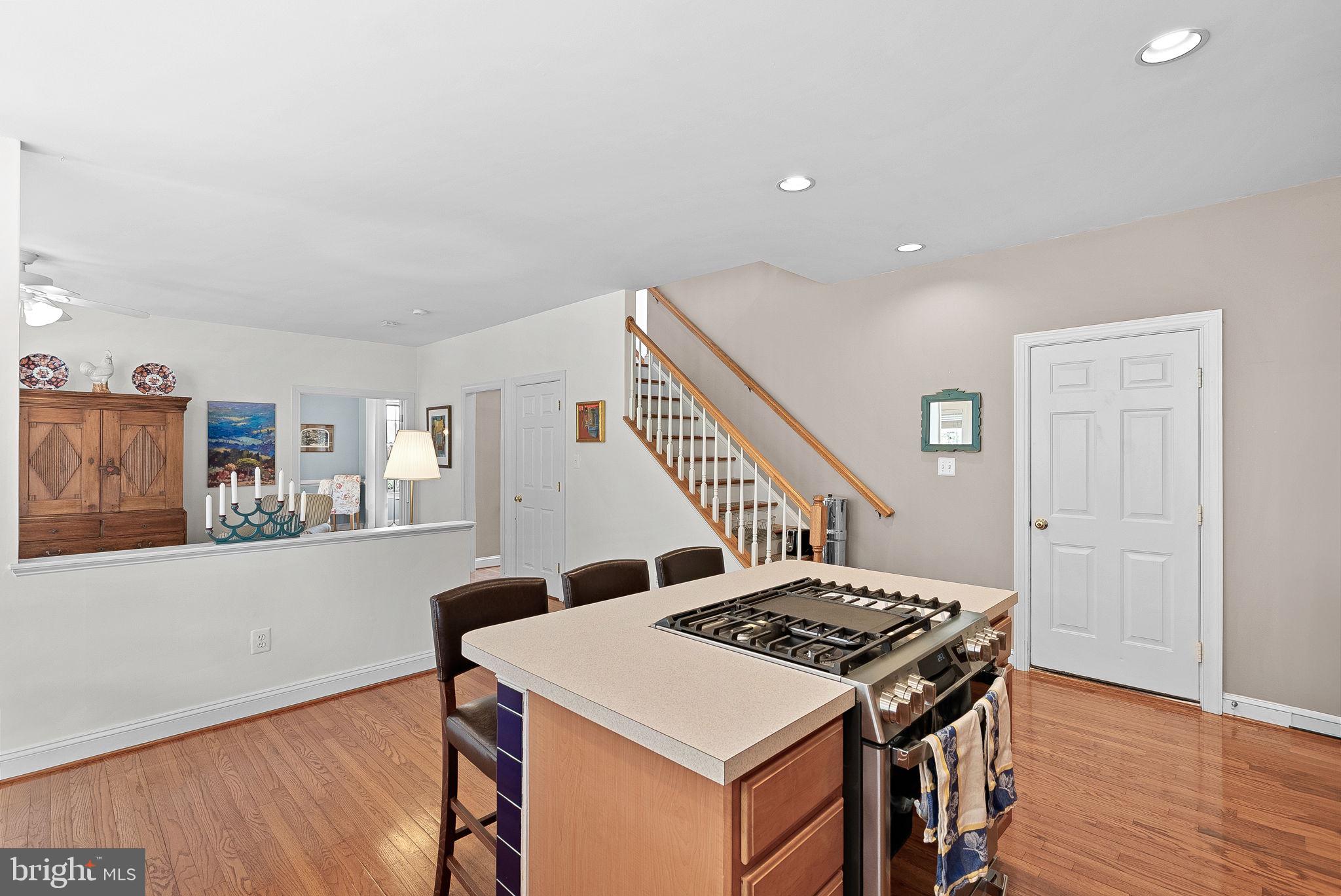 1921 Harvest Drive Winchester, VA 22601 - Photo 19 of 44 a kitchen that has a stove and a wooden floor
