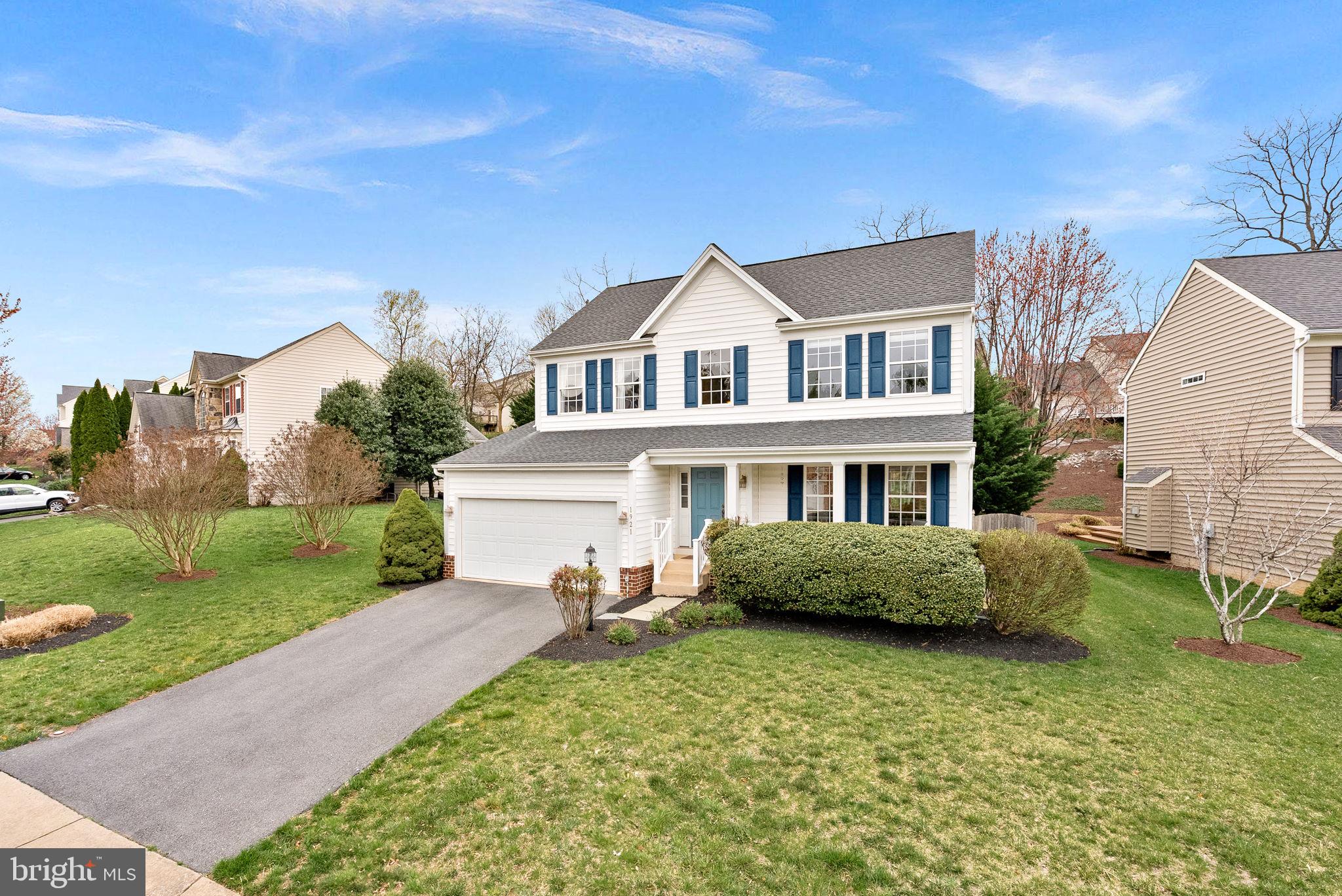 1921 Harvest Drive Winchester, VA 22601 - Photo 2 of 44 a front view of a house with a garden