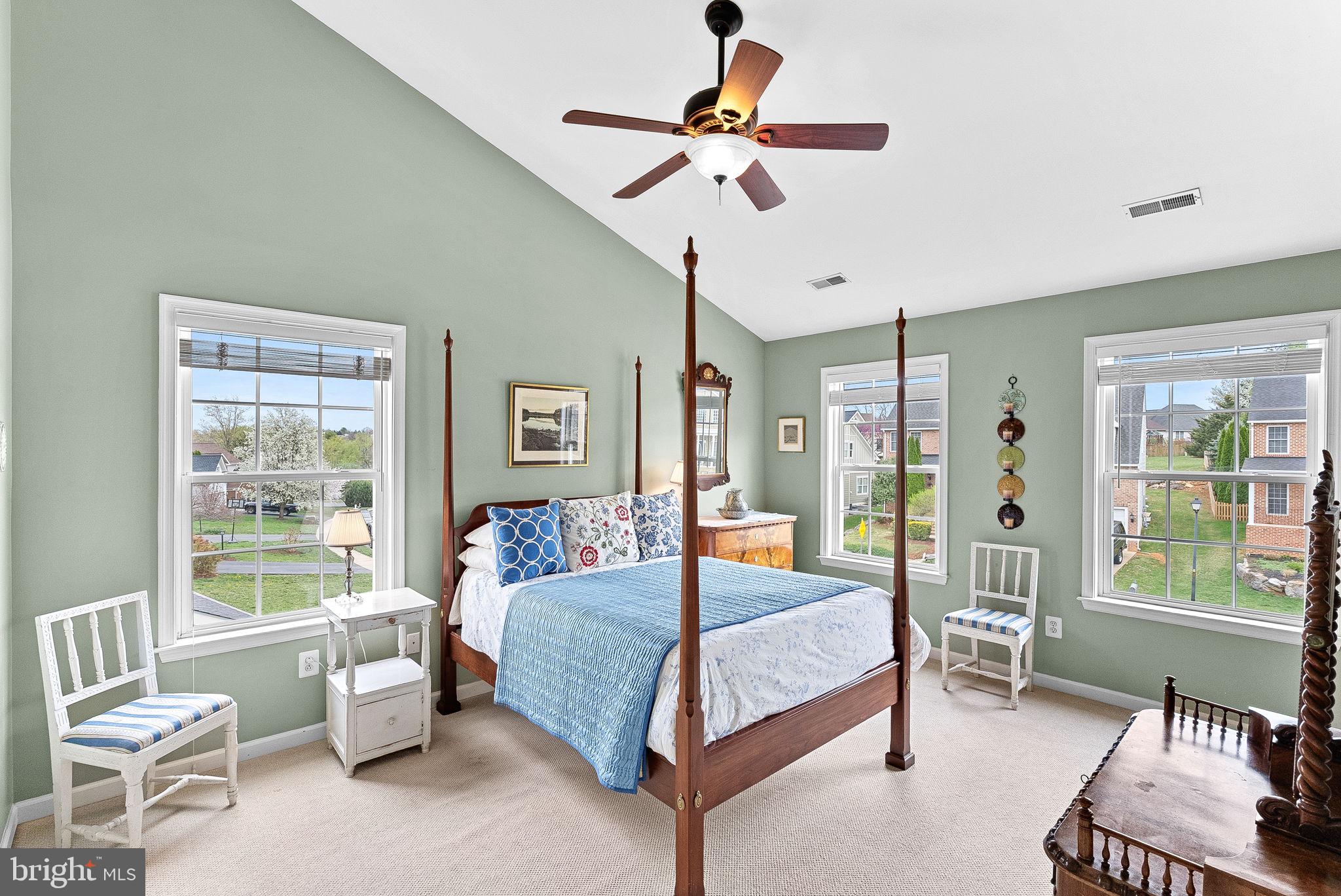 1921 Harvest Drive Winchester, VA 22601 - Photo 25 of 44 a bedroom with a bed a couch and a window