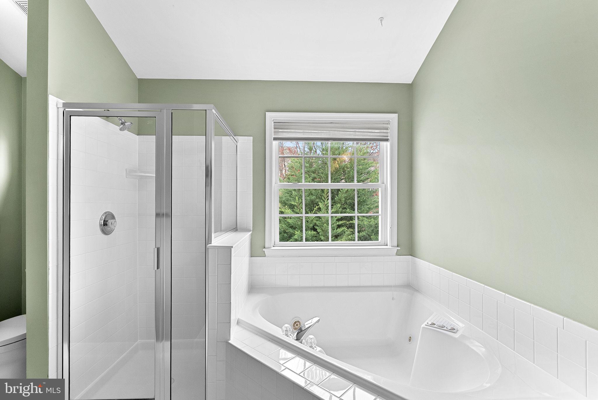 1921 Harvest Drive Winchester, VA 22601 - Photo 28 of 44 a bathroom with a tub and shower