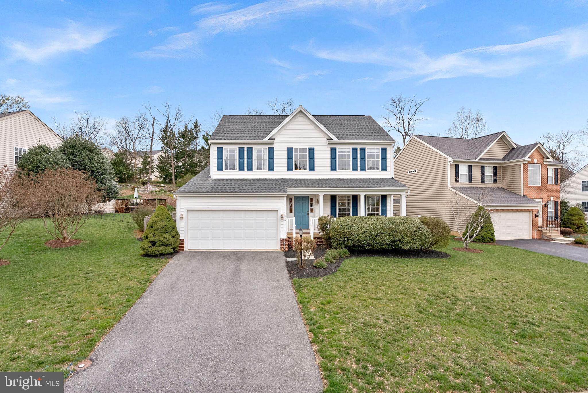 1921 Harvest Drive Winchester, VA 22601 - Photo 3 of 44 a front view of a house with garden