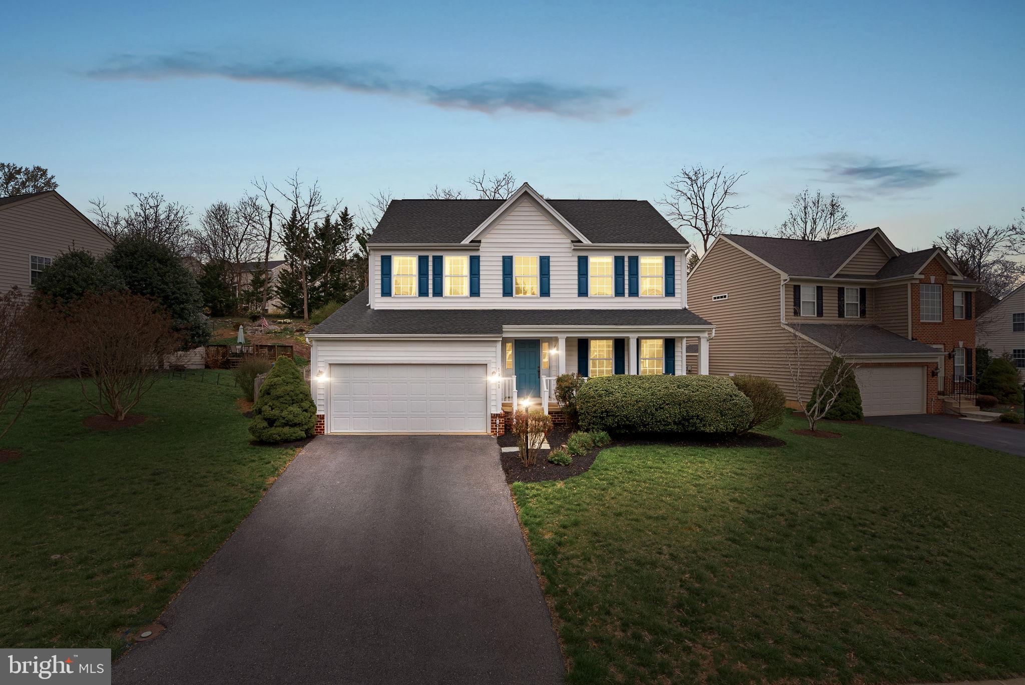 1921 Harvest Drive Winchester, VA 22601 - Photo 5 of 44 a front view of a house with garden