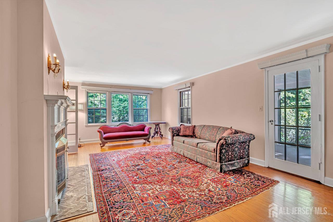 1010 River Road Piscataway, NJ 08854 - Photo 11 of 47 a living room with furniture and a rug