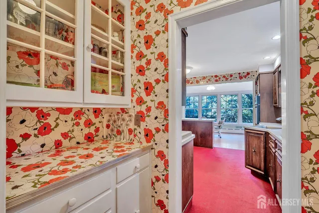 a kitchen with stainless steel appliances a stove and a refrigerator
