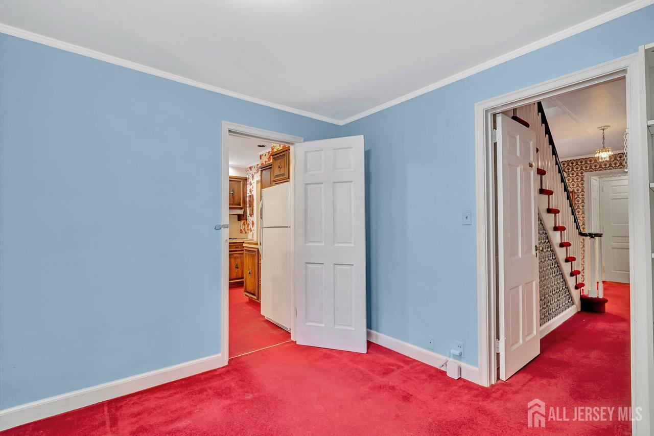 1010 River Road Piscataway, NJ 08854 - Photo 20 of 47 a view of a livingroom with wooden floor and entryway