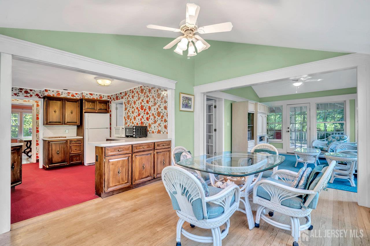 1010 River Road Piscataway, NJ 08854 - Photo 22 of 47 a dining hall with stainless steel appliances kitchen island granite countertop furniture and a kitchen view