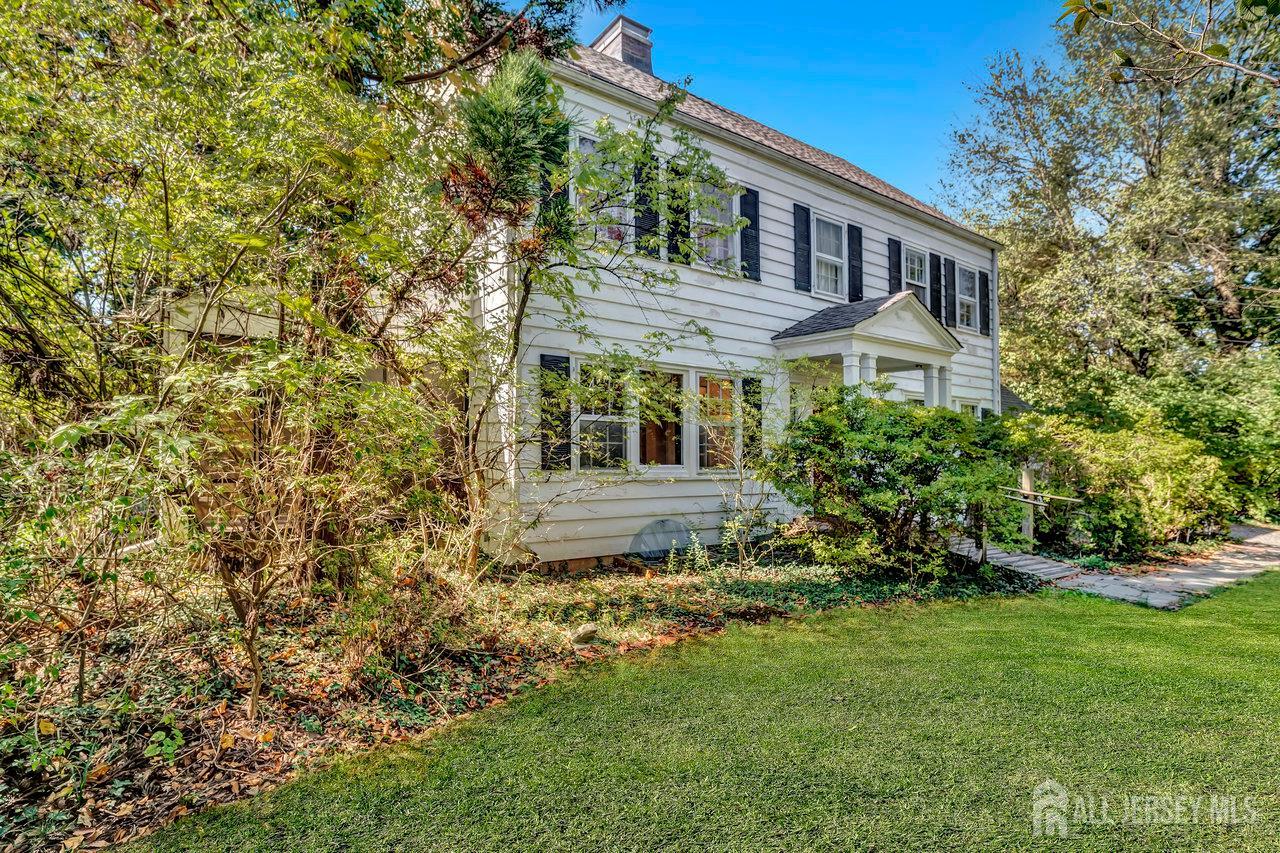 1010 River Road Piscataway, NJ 08854 - Photo 4 of 47 a view of house with a yard