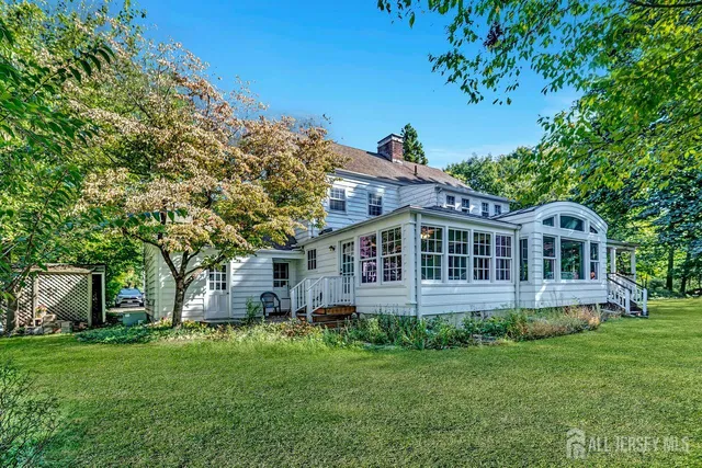 a black and white photo of a living room