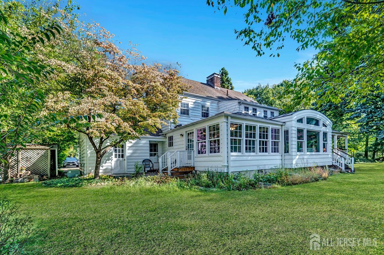 1010 River Road Piscataway, NJ 08854 - Photo 45 of 47 a front view of a house with a garden