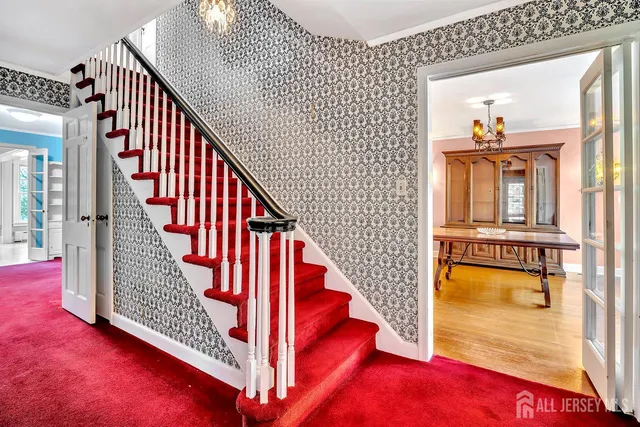 a view of a hallway with staircase