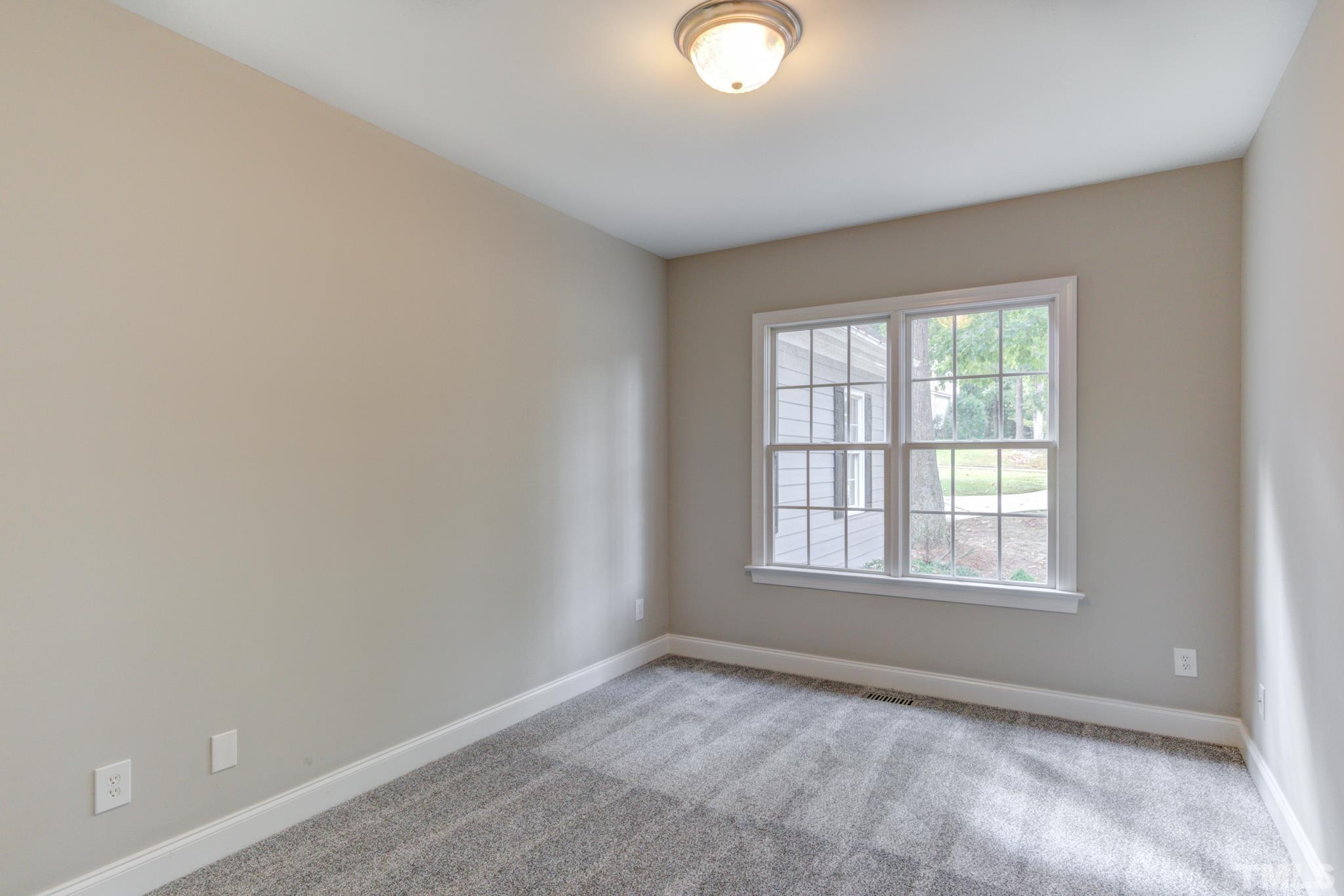 4425 Irene Way Raleigh, NC 27603 - Photo 14 of 28 an empty room with a window