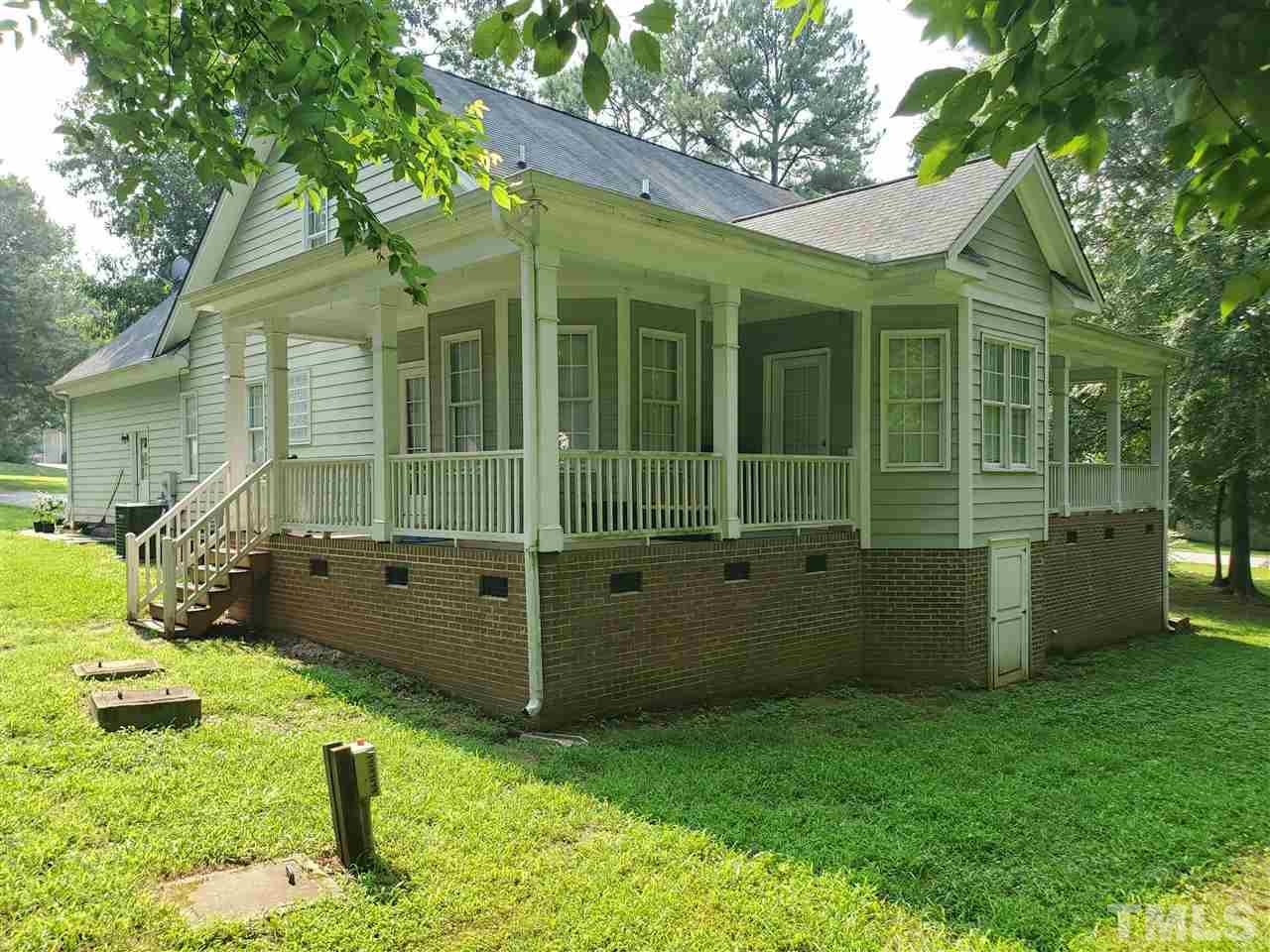 4425 Irene Way Raleigh, NC 27603 - Photo 3 of 28 a view of a house with a backyard