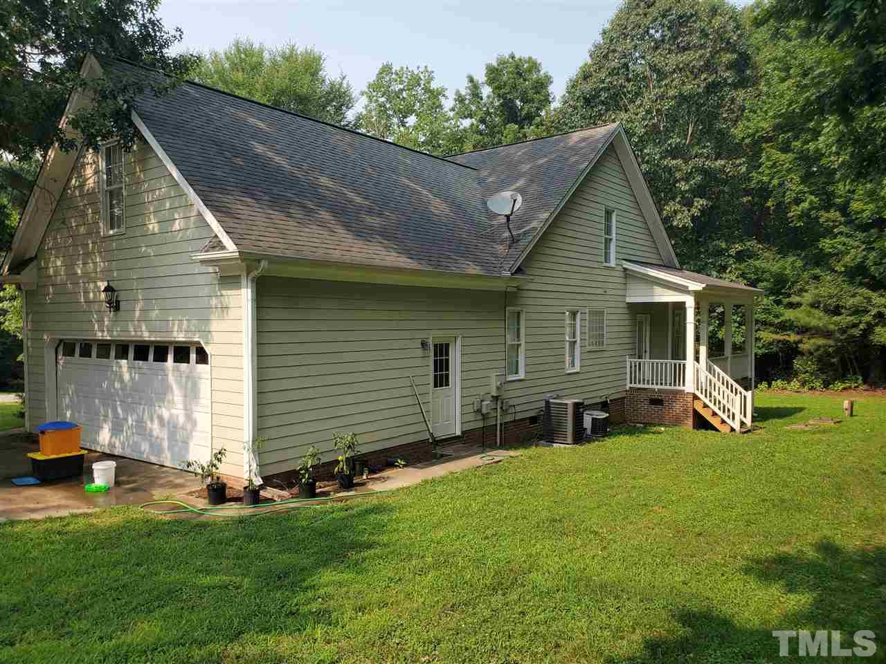 4425 Irene Way Raleigh, NC 27603 - Photo 4 of 28 a view of a house with a yard