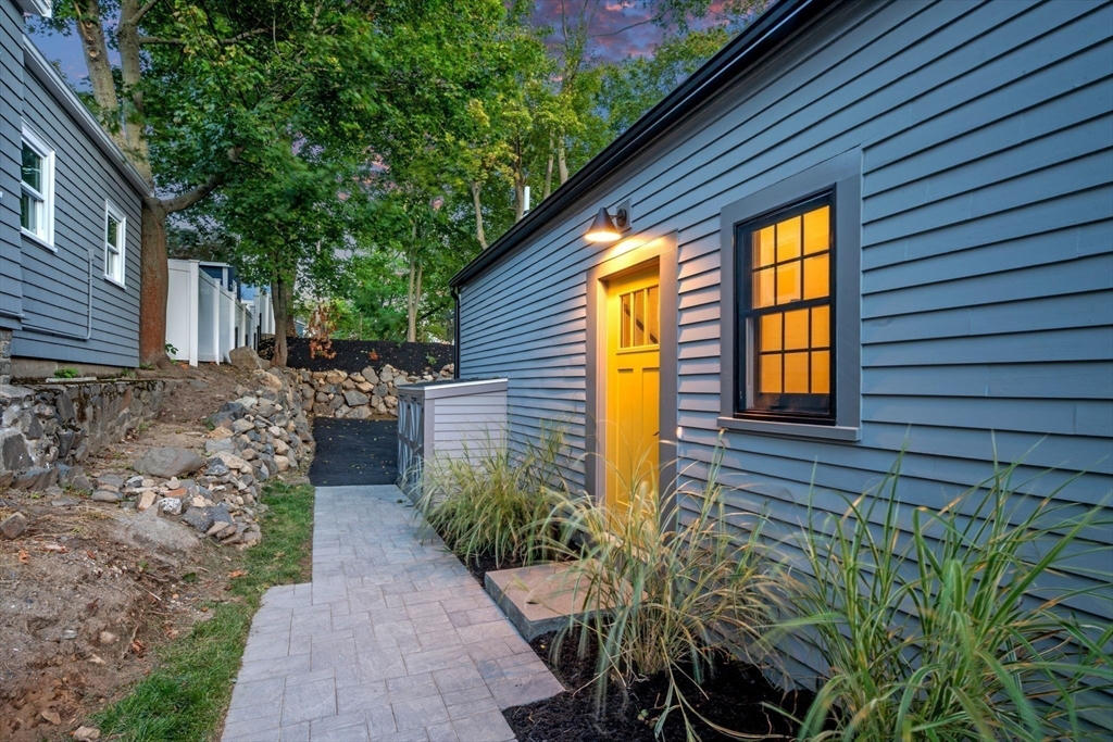 134 Elm Street, Unit 134 Marblehead, MA 01945 - Photo 34 of 38 a view of a backyard with plants