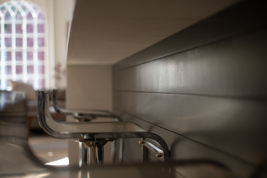134 Elm Street, Unit 134 Marblehead, MA 01945 - Photo 8 of 38 a bathroom with a sink and a mirror