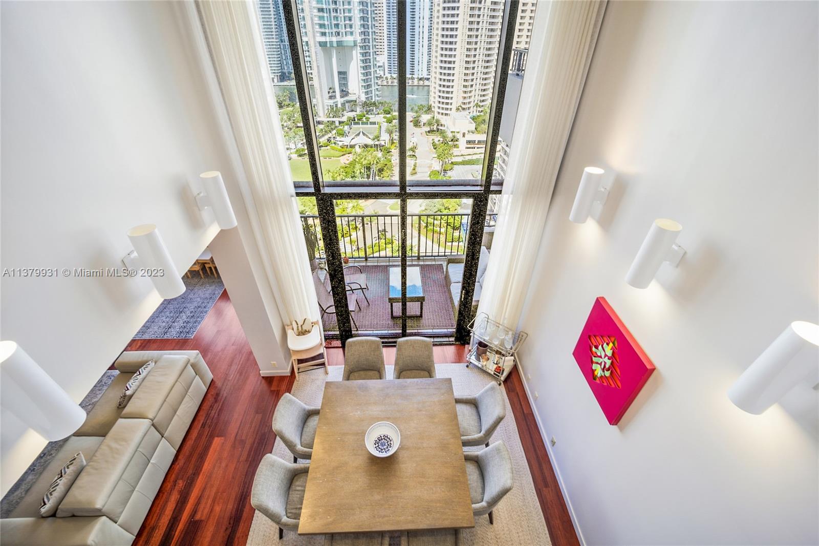 520 Brickell Key Drive, Unit APH10 Miami, FL 33131 - Photo 18 of 23 a view of living room with furniture and rug