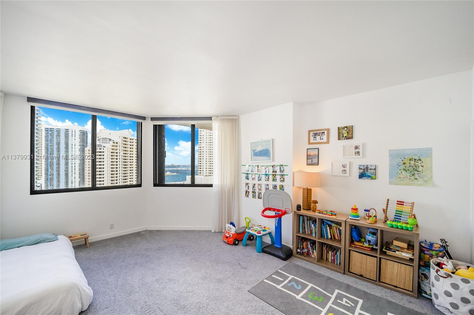 520 Brickell Key Drive, Unit APH10 Miami, FL 33131 - Photo 20 of 23 a view of a livingroom with toys