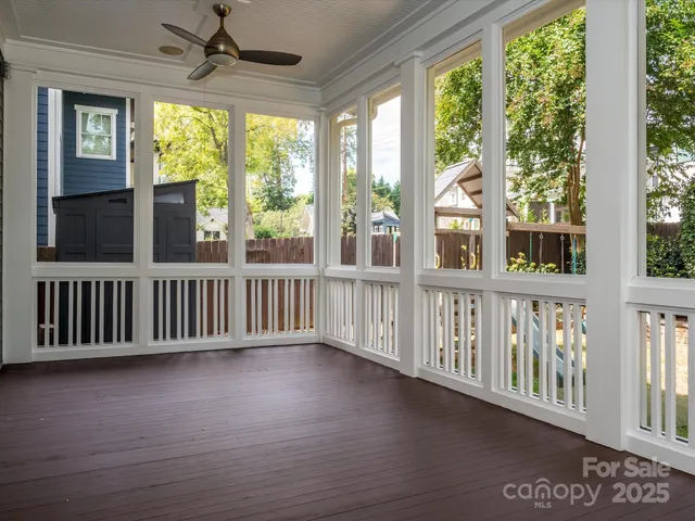 a view of a porch with wooden floor and outdoor space