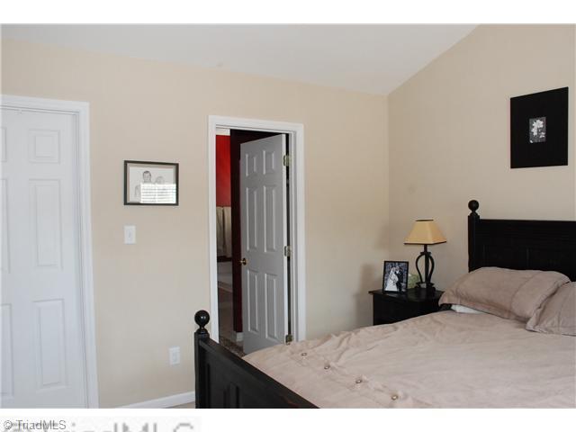 3707 Pointer Court High Point, NC 27265 - Photo 7 of 15 Master Bedroom. The master bedroom has vaulted ceilings, a great walk-in closet and ceiling fan lighting.