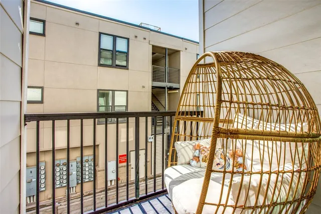 a view of staircase with a floor to ceiling window