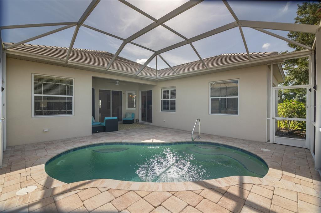 12150 Mapleridge Drive Parrish, FL 34219 - Photo 22 of 45 a house view with a backyard space