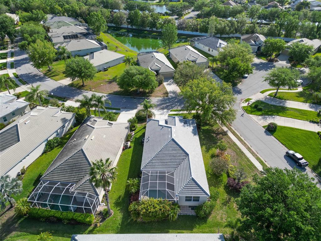 12150 Mapleridge Drive Parrish, FL 34219 - Photo 30 of 45 an aerial view of residential house with outdoor space and swimming pool
