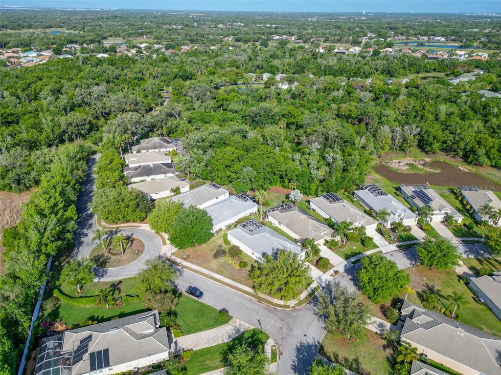 12150 Mapleridge Drive Parrish, FL 34219 - Photo 33 of 45 an aerial view of residential houses with outdoor space