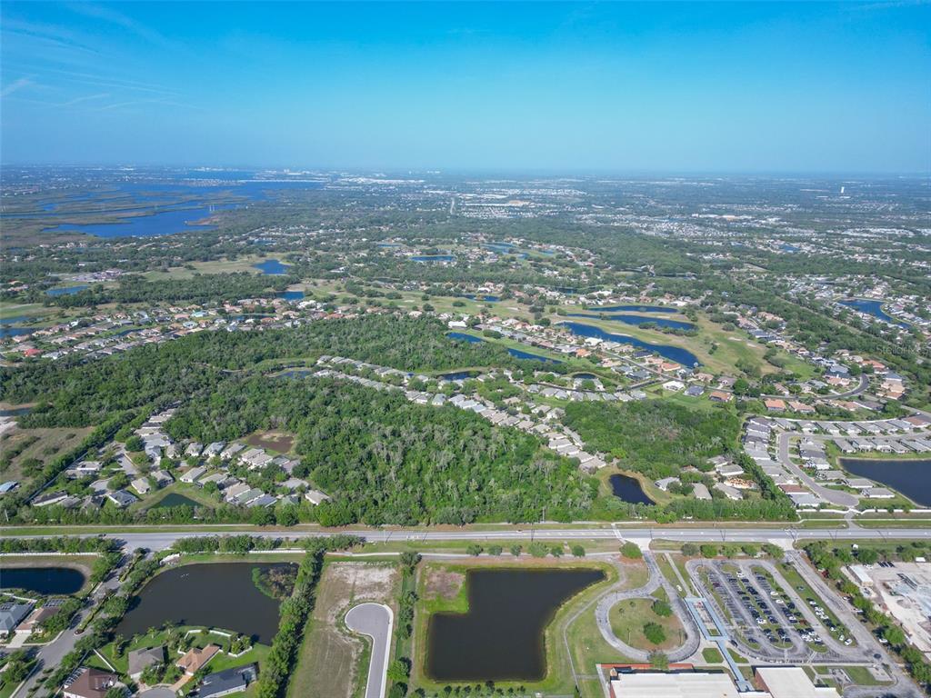 12150 Mapleridge Drive Parrish, FL 34219 - Photo 37 of 45 an aerial view of a city with lots of residential buildings