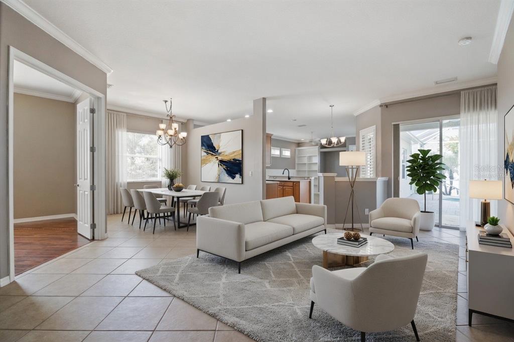 12150 Mapleridge Drive Parrish, FL 34219 - Photo 5 of 45 a living room with furniture and a large window