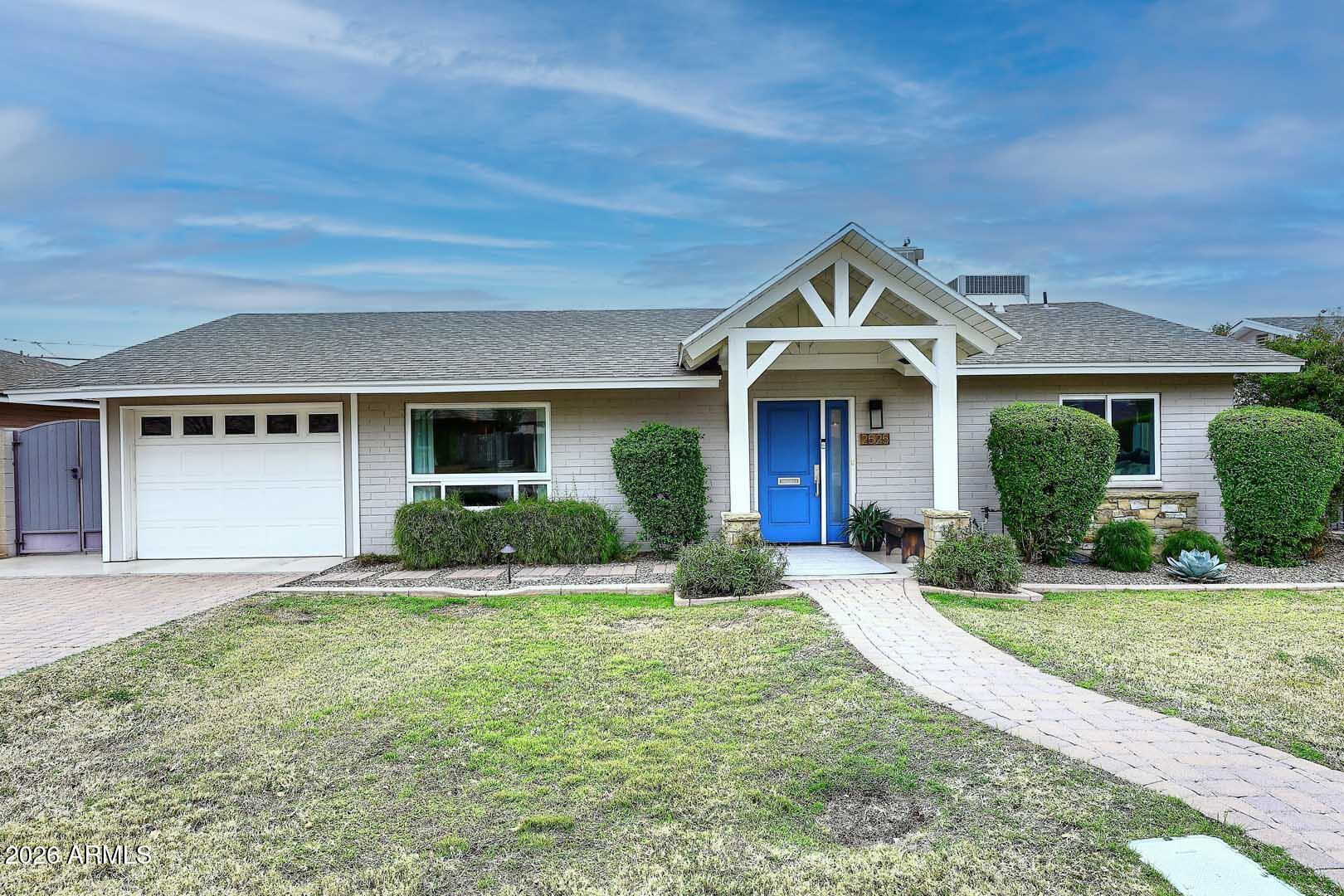 2525 East Pierson Street Phoenix, AZ 85016 - Photo 1 of 36 front view of a house with a yard