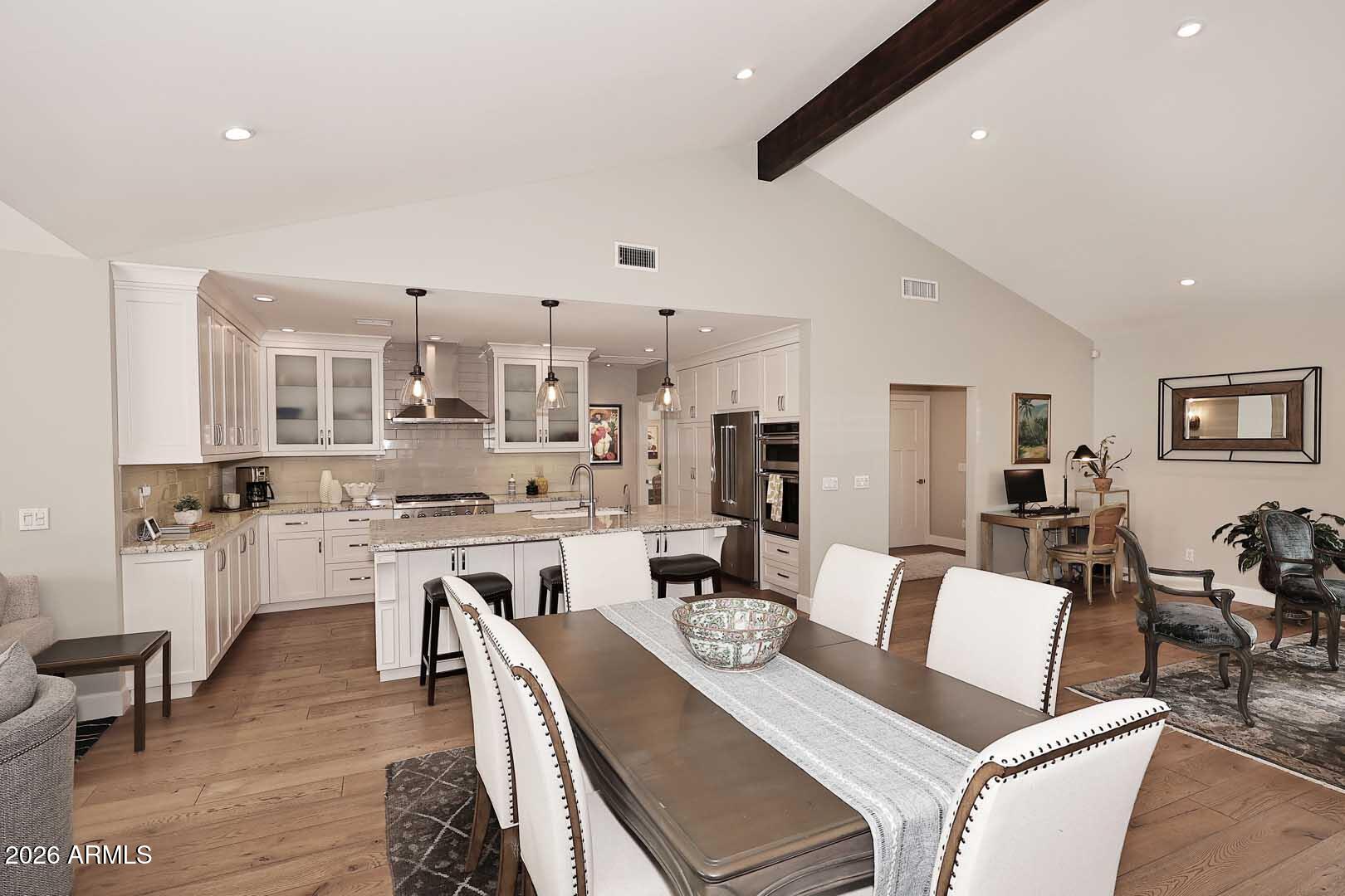 2525 East Pierson Street Phoenix, AZ 85016 - Photo 11 of 36 a living room with lots of furniture and kitchen view