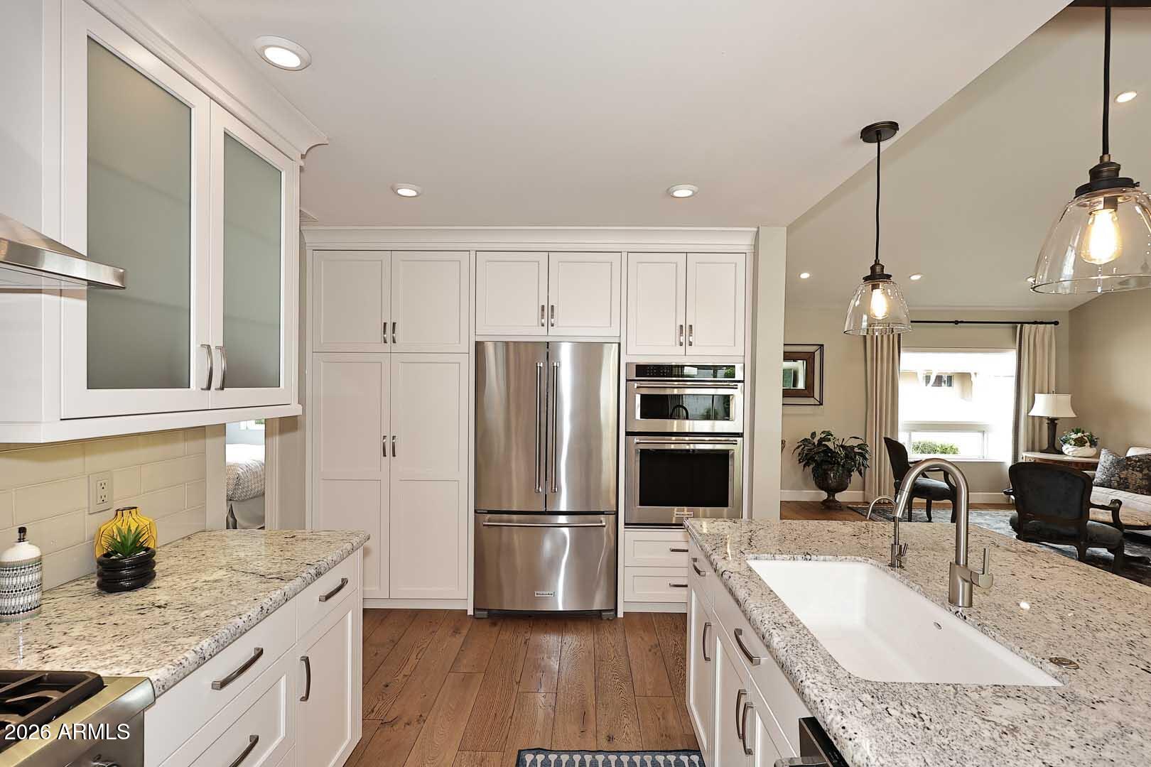 2525 East Pierson Street Phoenix, AZ 85016 - Photo 15 of 36 a kitchen with a refrigerator sink and stove