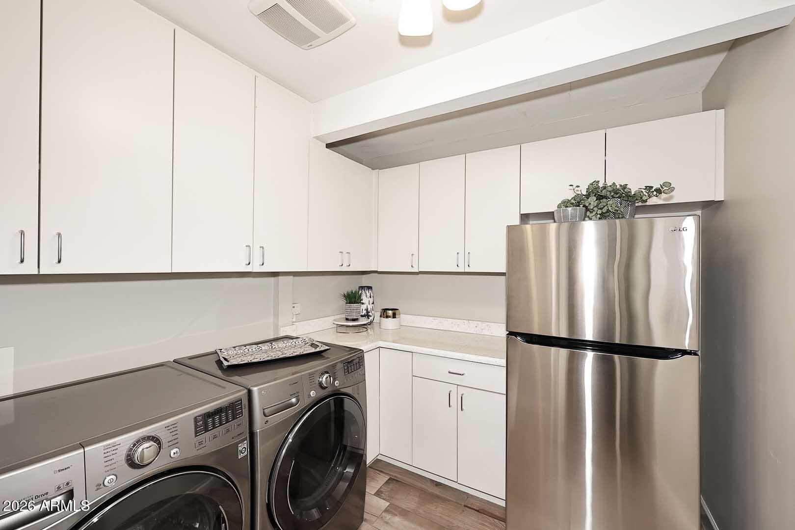 2525 East Pierson Street Phoenix, AZ 85016 - Photo 17 of 36 a utility room with dryer and washer
