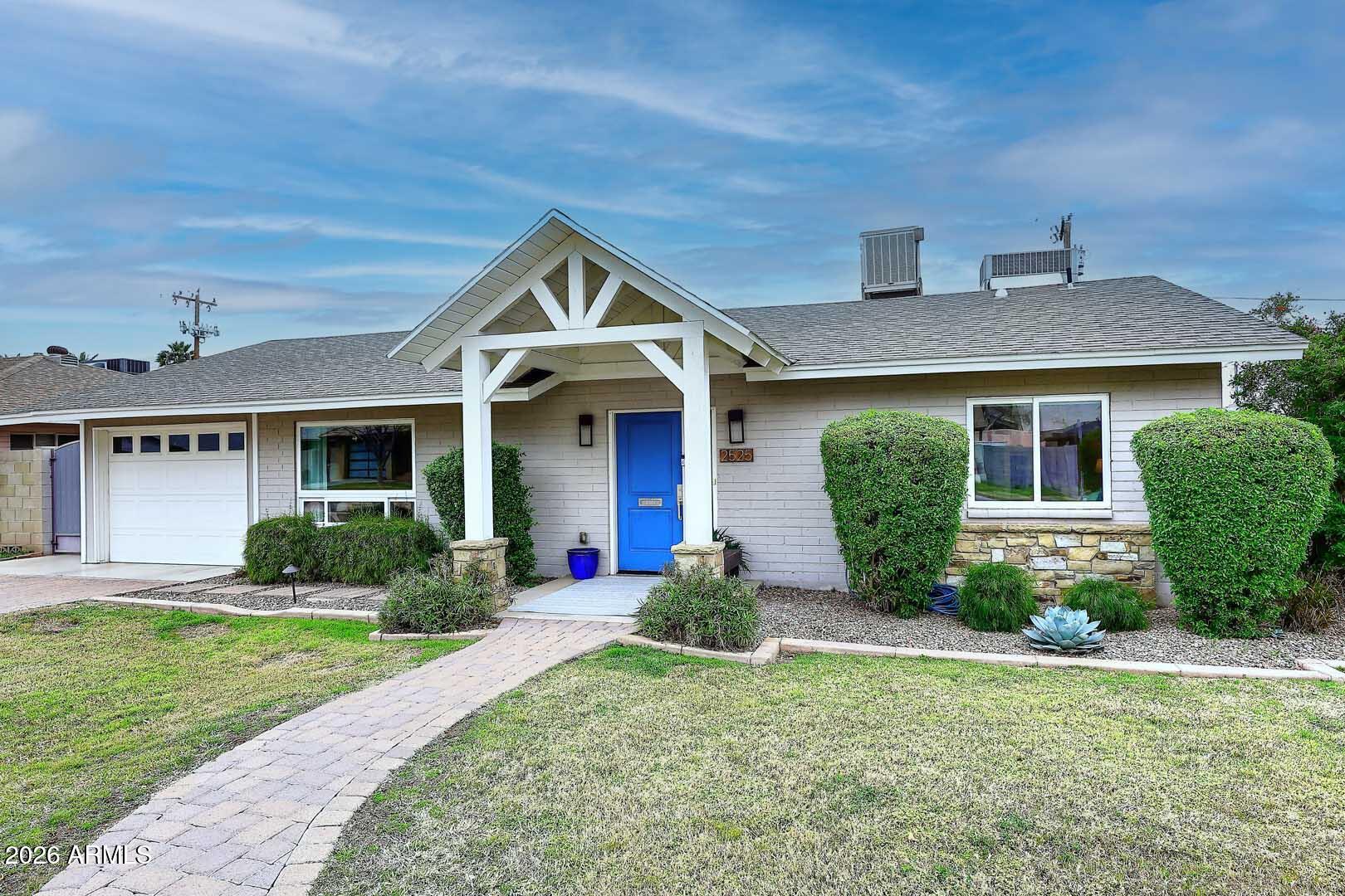2525 East Pierson Street Phoenix, AZ 85016 - Photo 2 of 36 front view of a house with a yard