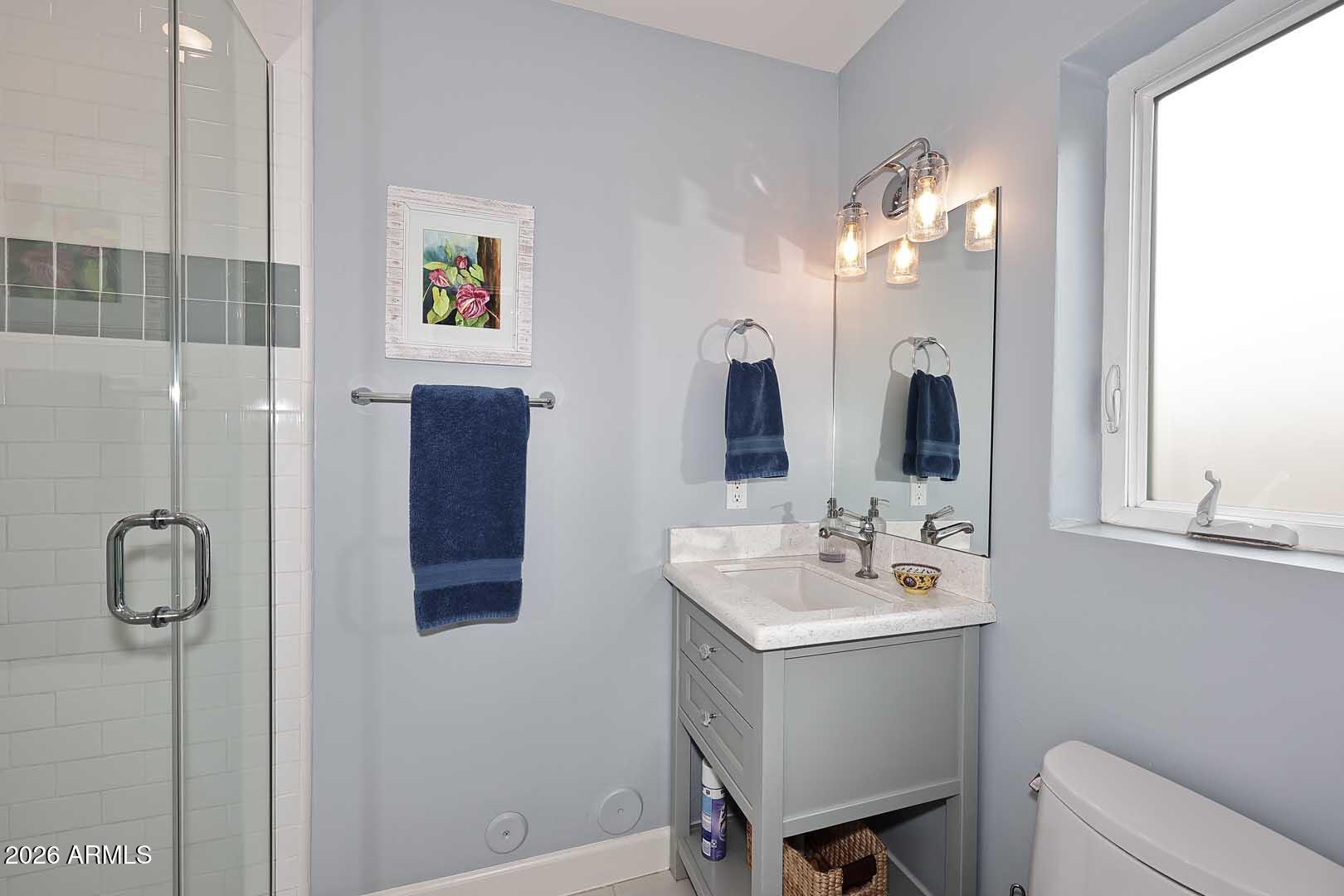 2525 East Pierson Street Phoenix, AZ 85016 - Photo 21 of 36 a bathroom with a sink vanity and toilet