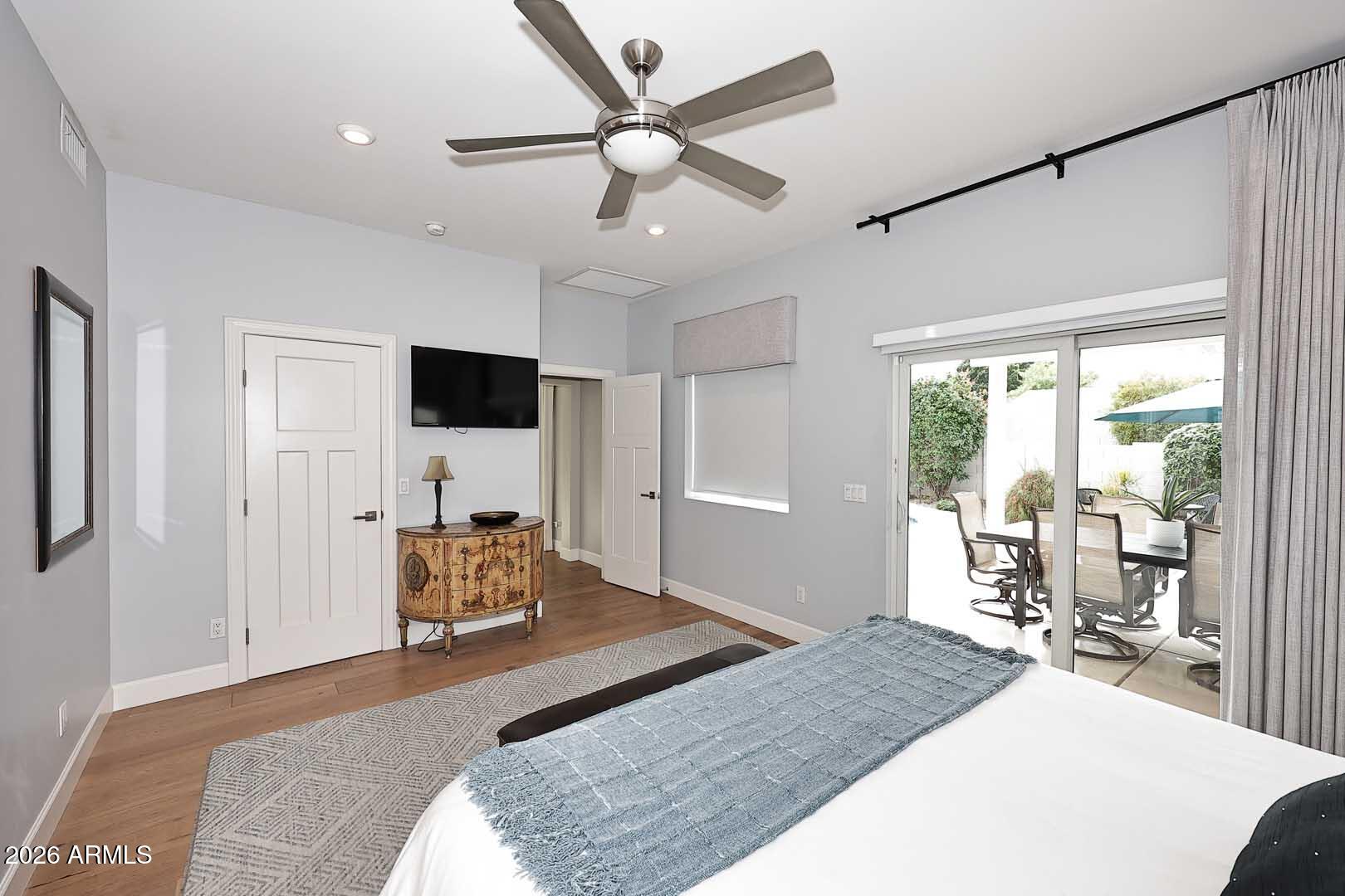 2525 East Pierson Street Phoenix, AZ 85016 - Photo 26 of 36 a bedroom with a bed a large window and furniture