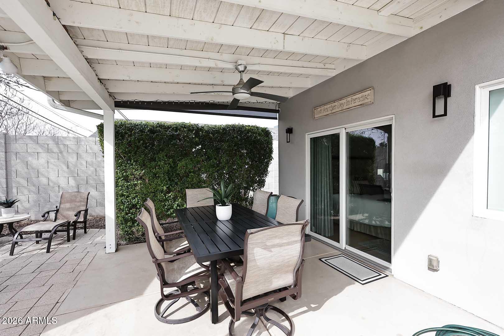 2525 East Pierson Street Phoenix, AZ 85016 - Photo 31 of 36 a view of a patio with table and chairs and potted plants
