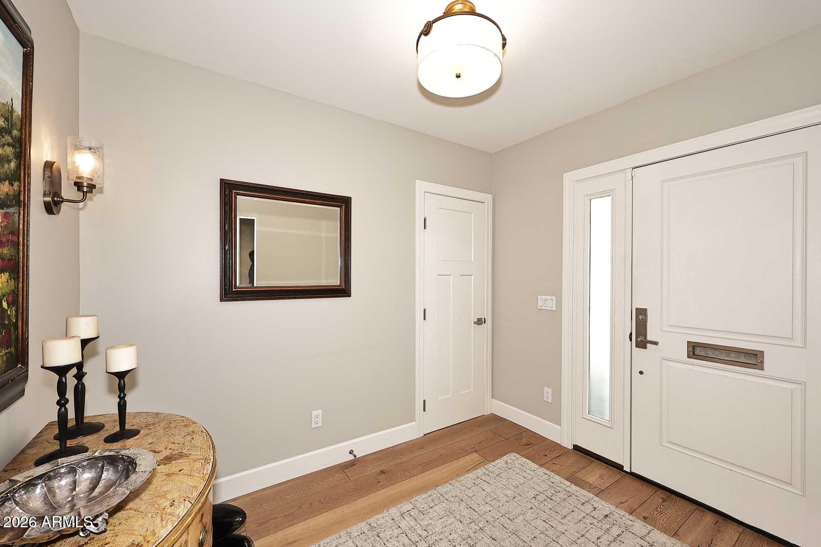 2525 East Pierson Street Phoenix, AZ 85016 - Photo 4 of 36 a view of a room with wooden floor and closet